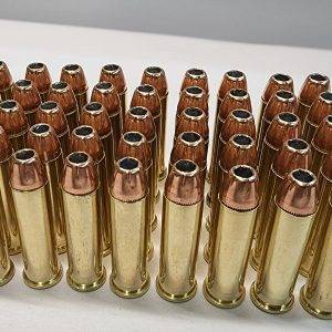 357 Mag. 158 gr. XTP HP Loose remanufactured rifle ammo pile with a sticker that says Ammo by Pistol Pete and has a character holding two guns in the air.